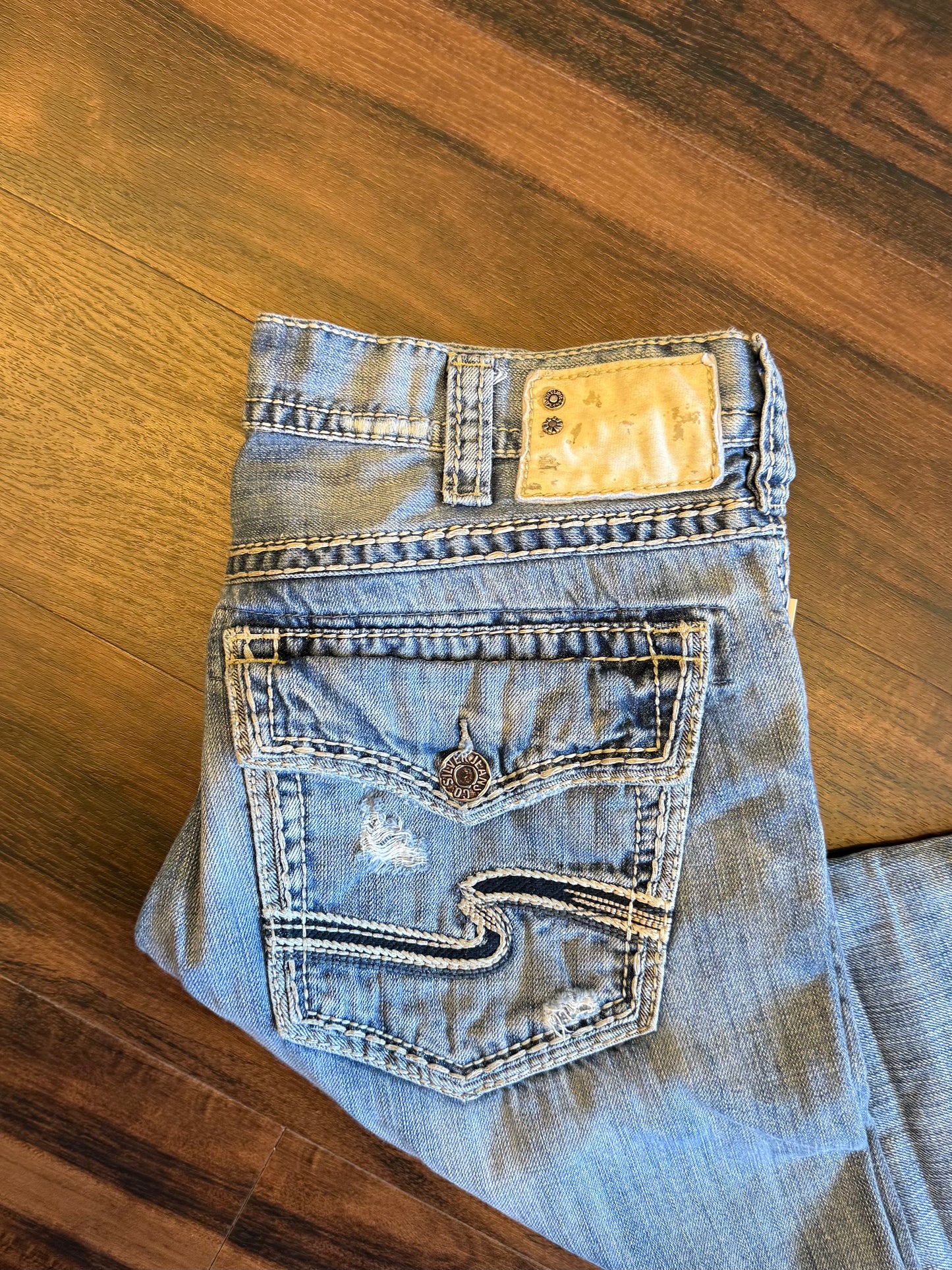 Vintage Silver Light Wash Distressed Boot Cut Jeans- 36x32