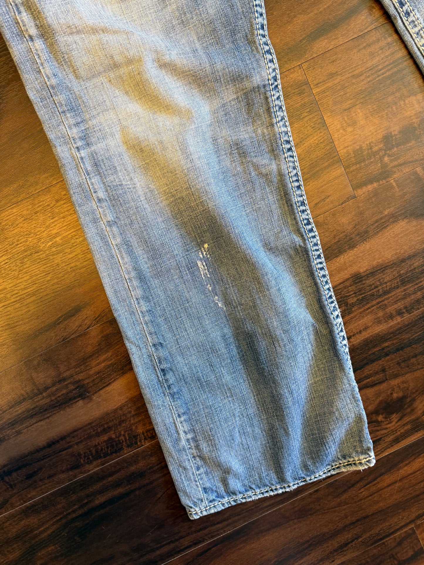 Vintage Silver Light Wash Distressed Boot Cut Jeans- 36x32