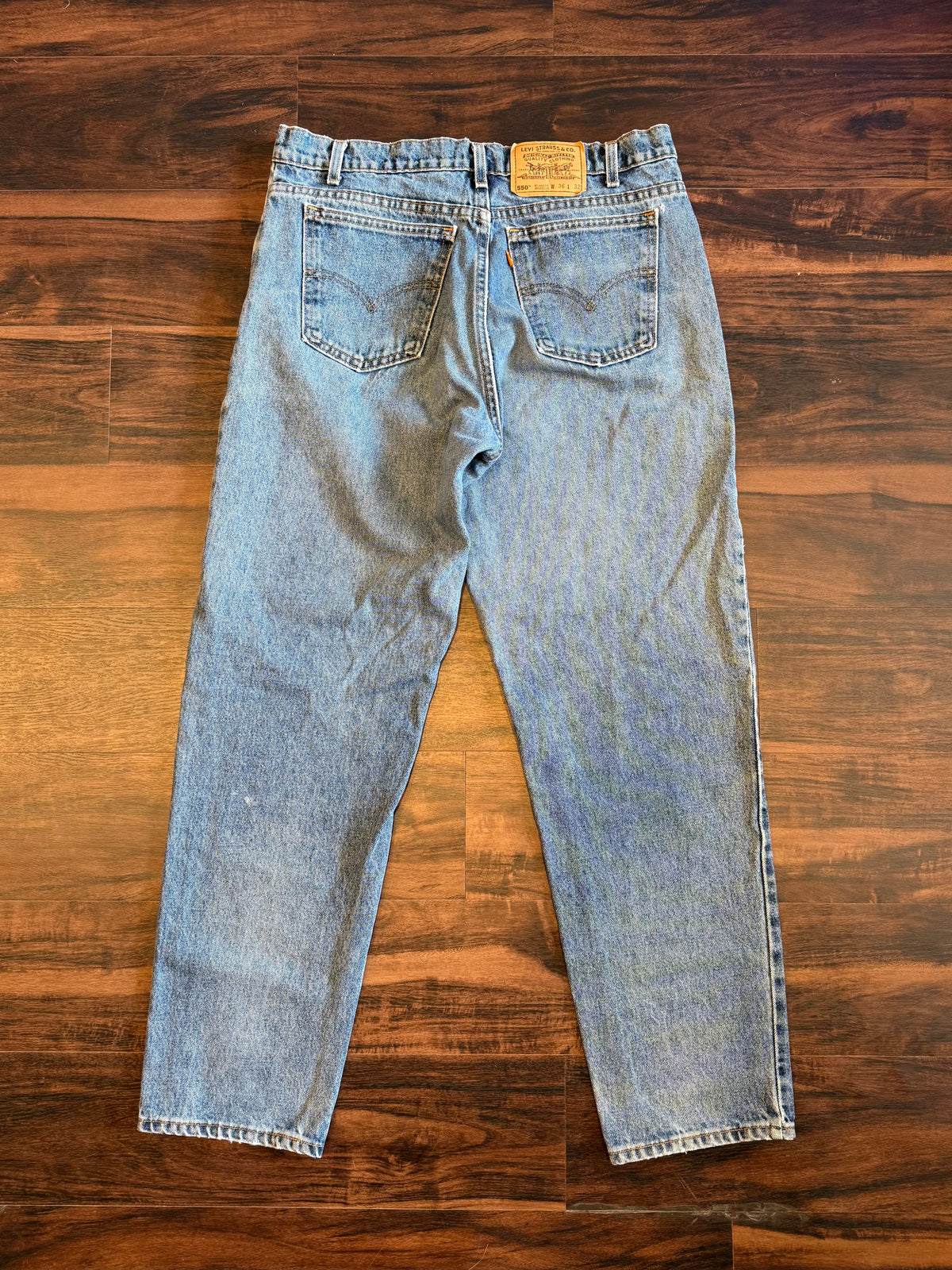Vintage Levi’s 550 Orange Tab Light Wash Denim Jeans- 34x32