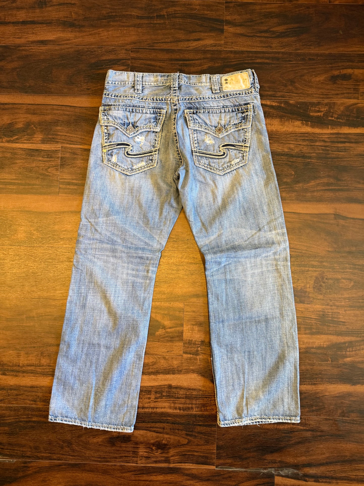 Vintage Silver Light Wash Distressed Boot Cut Jeans- 36x32