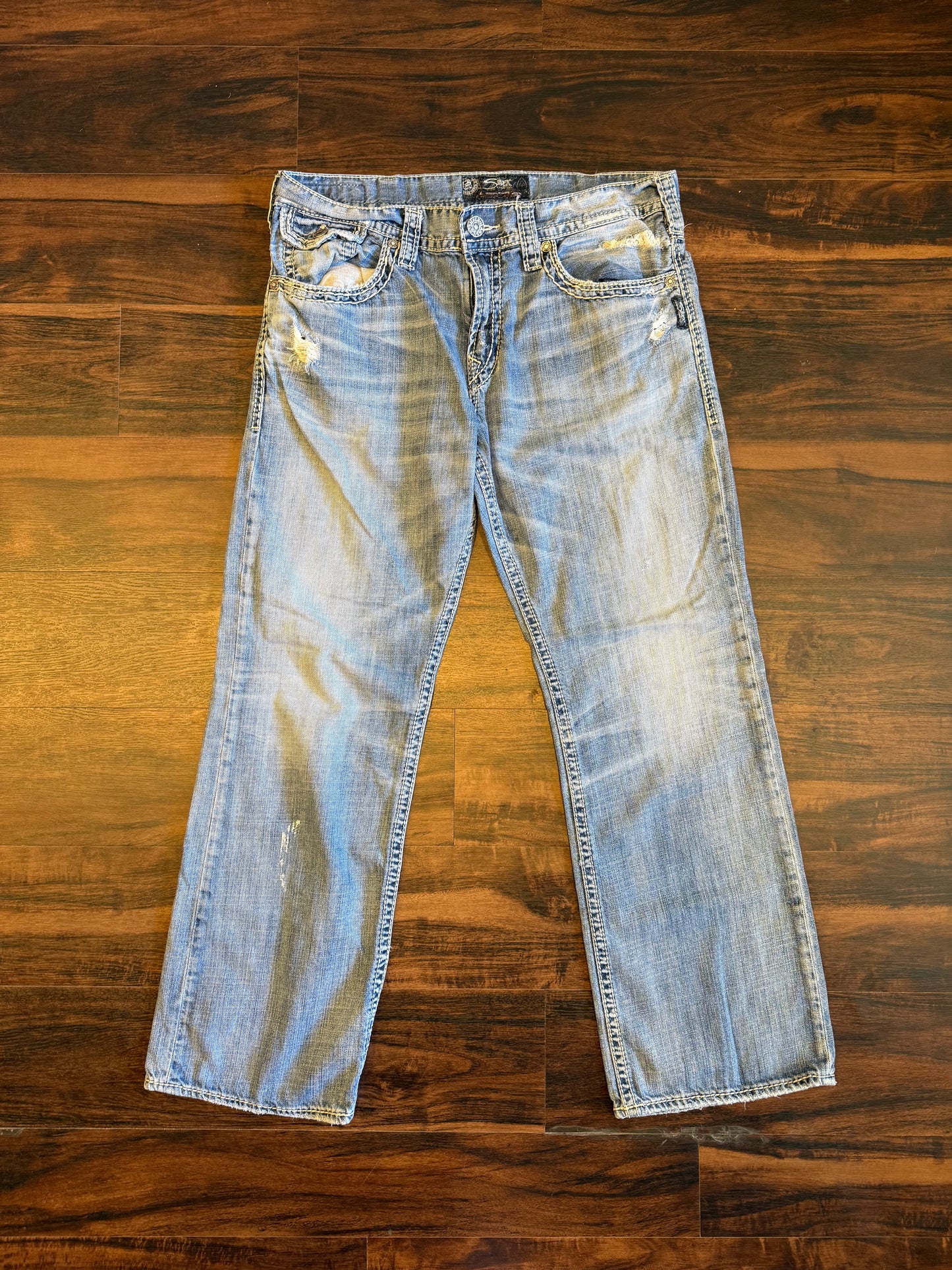 Vintage Silver Light Wash Distressed Boot Cut Jeans- 36x32